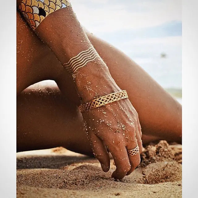 Goldfish Kiss wearing Mermaid Scale Bangle with Flash Tattoos